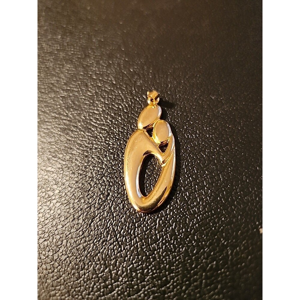 Gold Tone Mother's And Child Pendant/Charm